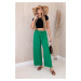 Wide-waisted trousers in green colour