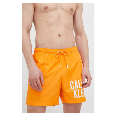 Plavkové šortky Calvin Klein oranžová farba