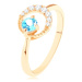 Zlatý prsteň 375 - kosák mesiaca zdobený čírymi zirkónikmi, modrý topás - Veľkosť: 62 mm