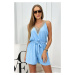 Short jumpsuit with decorative lace in blue color