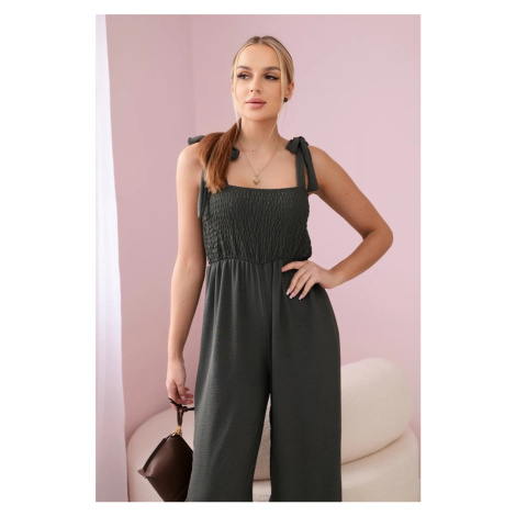 Waisted jumpsuit with a draped top in khaki