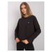 Black cotton blouse with long sleeves