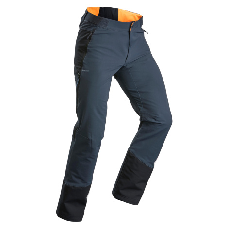 Hrejivé pánske nohavice sh520 x-warm na zimnú turistiku vodoodpudivé s návlekmi QUECHUA
