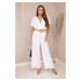 Jumpsuit with decorative belt at the waist white