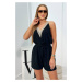 Short jumpsuit with decorative lace in black color