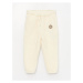 LC Waikiki Baby Boy Jogger Tracksuit Bottoms with an Elastic Printed Waist.