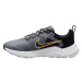 Juniorská športová obuv (tréningová) NIKE Downshifter 12 cool grey metallic gold black white