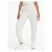 Krémové dámske tepláky Puma ESS+ Embroidery High-Waist Pants