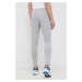 Tréningové nohavice adidas Essentials šedá farba, melanžové, IC0046