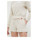 Bavlnené šortky Hummel béžová farba, jednofarebné, stredne vysoký pás, 219478