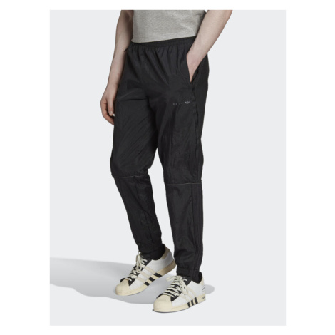 Adidas Teplákové nohavice Reveal Material Mix HK2732 Čierna Regular Fit