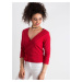 Blouse made of ribbed knitted fabric tied red