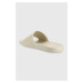 Šľapky Calvin Klein POOL SLIDE RUBBER pánske, béžová farba, HM0HM01062