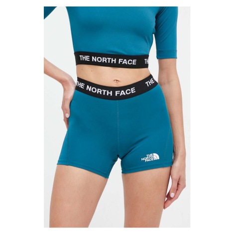 Športové krátke nohavice The North Face dámske, tyrkysová farba, s nášivkou, vysoký pás