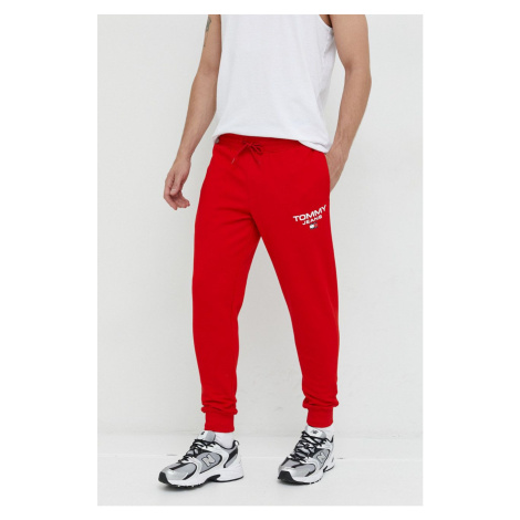 Bavlnené tepláky Tommy Jeans pánske, červená farba, s potlačou