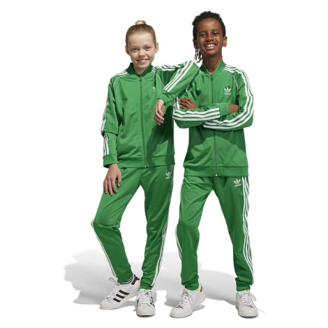 Detské tepláky adidas Originals zelená farba, s nášivkou