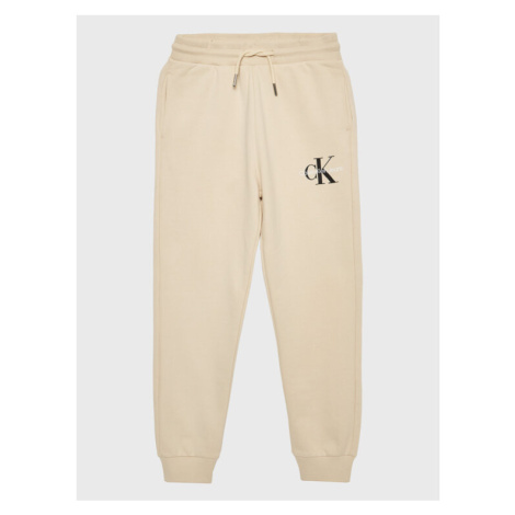 Calvin Klein Jeans Teplákové nohavice Monogram Logo IU0IU00285 Béžová Regular Fit