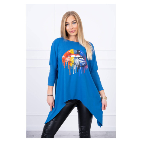 Oversize blouse with rainbow printed jeans