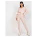 Light pink women's knitted trousers with tie