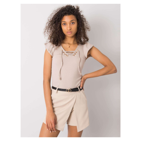 Beige blouse with a lace-up neckline