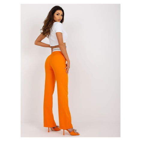 Oranžové elegantné splývavé nohavice