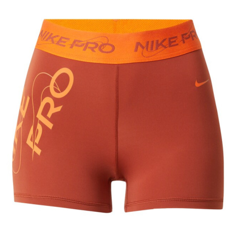 NIKE Športové nohavice  oranžová / koralová