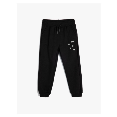 Koton Basic Jogger Sweatpants with Print Detail, Tie Waist and Pocket