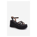 Black sandals on the Oporia platform and on the wedge