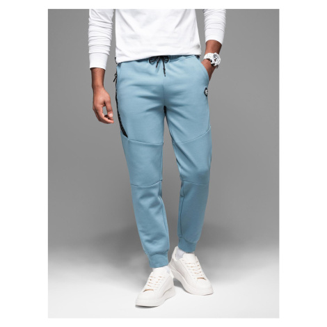 Ombre Men's sweatpants with ribbed cuffs and decorative zipper - light blue