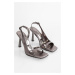 Shoeberry Women's Tobian Platinum Shiny Heel Shoes