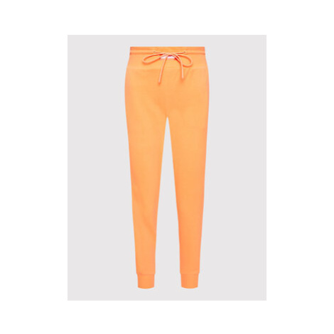 New Balance Teplákové nohavice WP21503 Oranžová Relaxed Fit