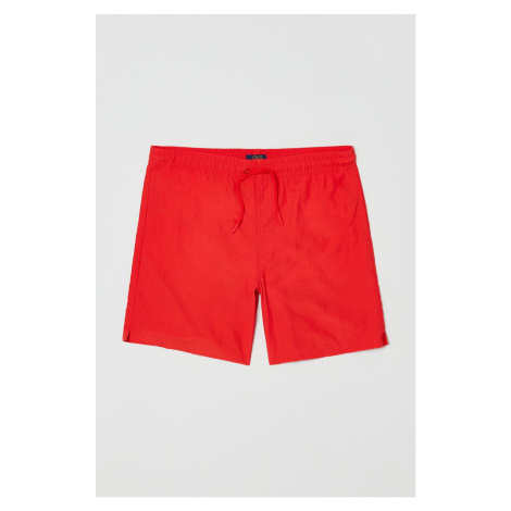 Detské plavkové šortky OVS červená farba