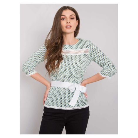 White and green blouse with colorful patterns