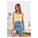 Knitted short top with shoulder straps, light yellow