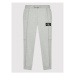 Calvin Klein Jeans Teplákové nohavice Rib Blocking Badge IB0IB00715 Sivá Regular Fit