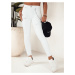 Biele skinny džínsy s odreninami a ozdobnou retiazkou ALEX UY1878