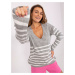 Lady's gray striped oversize sweater