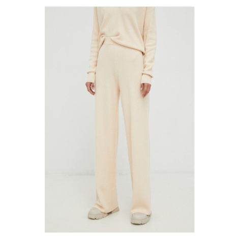 Nohavice s prímesou vlny Calvin Klein dámske, béžová farba, rovné, vysoký pás