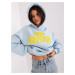 Light blue women's sweatshirt with inscription