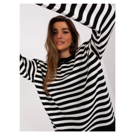 Black and ecru striped oversize sweater
