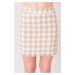 Beige and white miniskirt from BSL