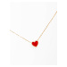 Gold necklace with red heart
