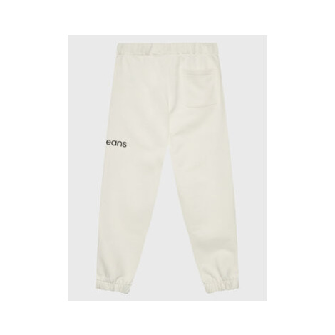 Calvin Klein Jeans Teplákové nohavice Disrupted Inst. Logo IU0IU00323 Béžová Regular Fit