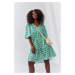 Loose green dress with puff sleeves