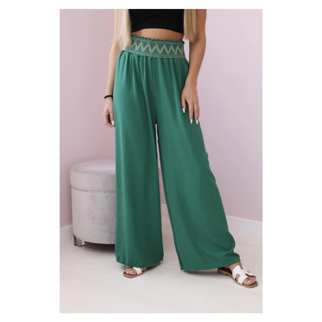 Trousers with a wide elastic waistband in green colour