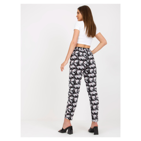Black light trousers made of fabric with SUBLEBEL flowers