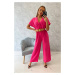 Jumpsuit with decorative belt at the waist fuchsia