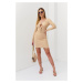 Ribbed beige dress with pleated