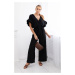 Jumpsuit with a tie at the waist with decorative sleeves in black