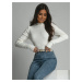 Lady's fitted cream turtleneck
